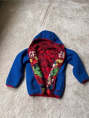 Reversible Marvel Kids Blue and red Puffer Jacket with Red Marvel graphics